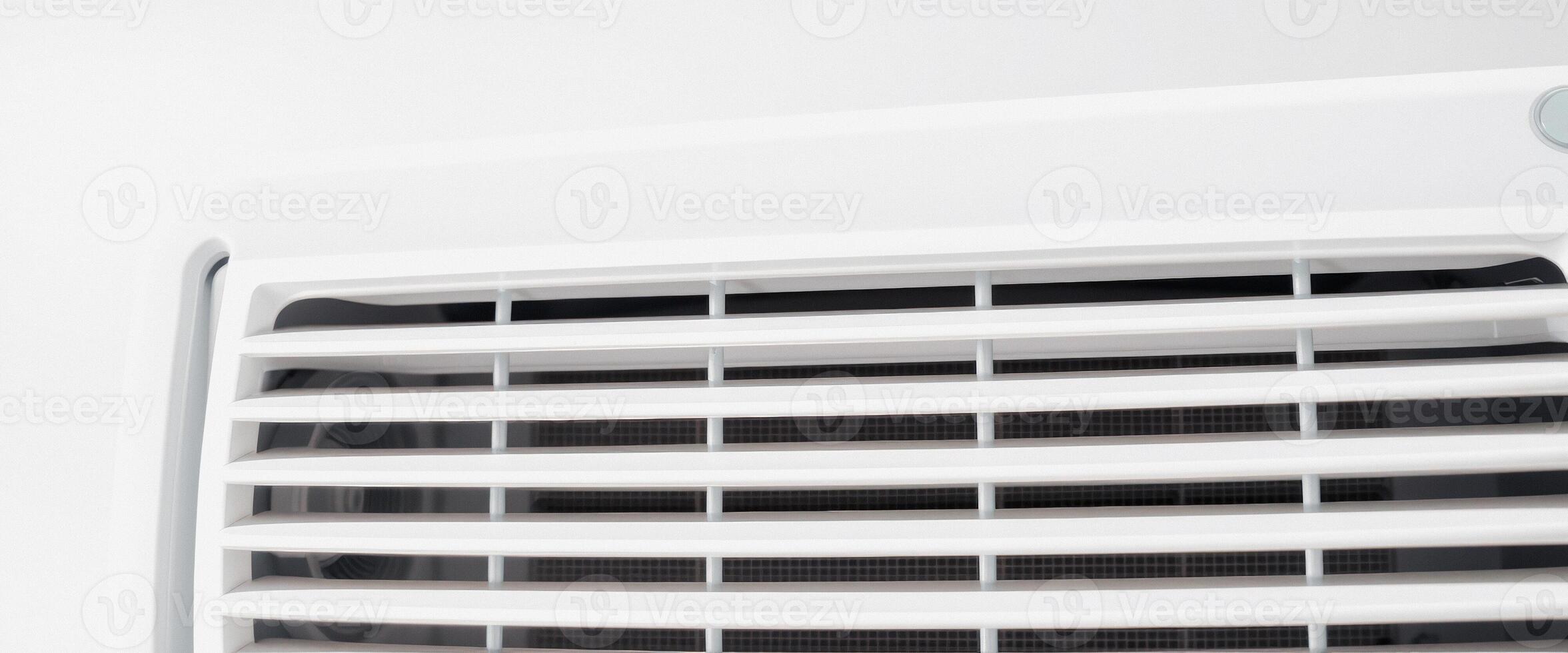 Closeup of a white air conditioning vent photo