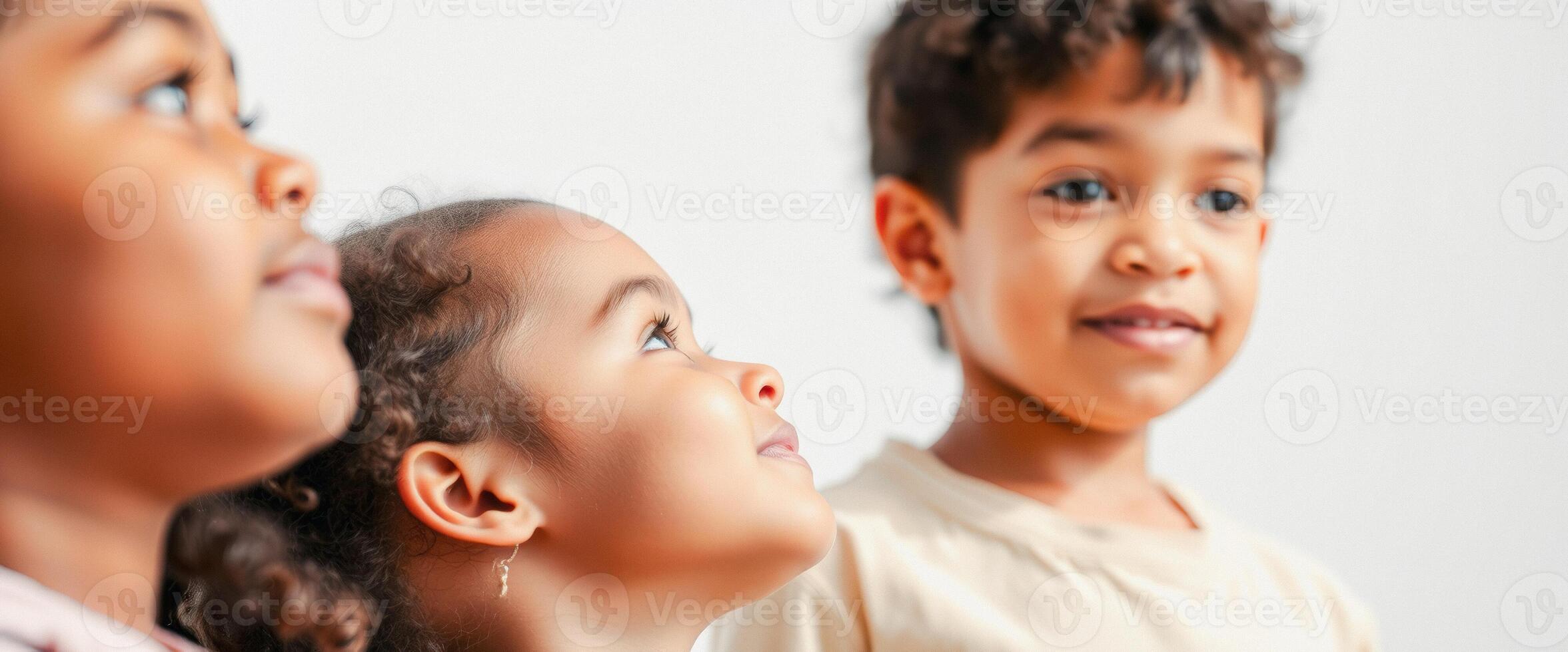 Three Children Looking Up In Wonder photo