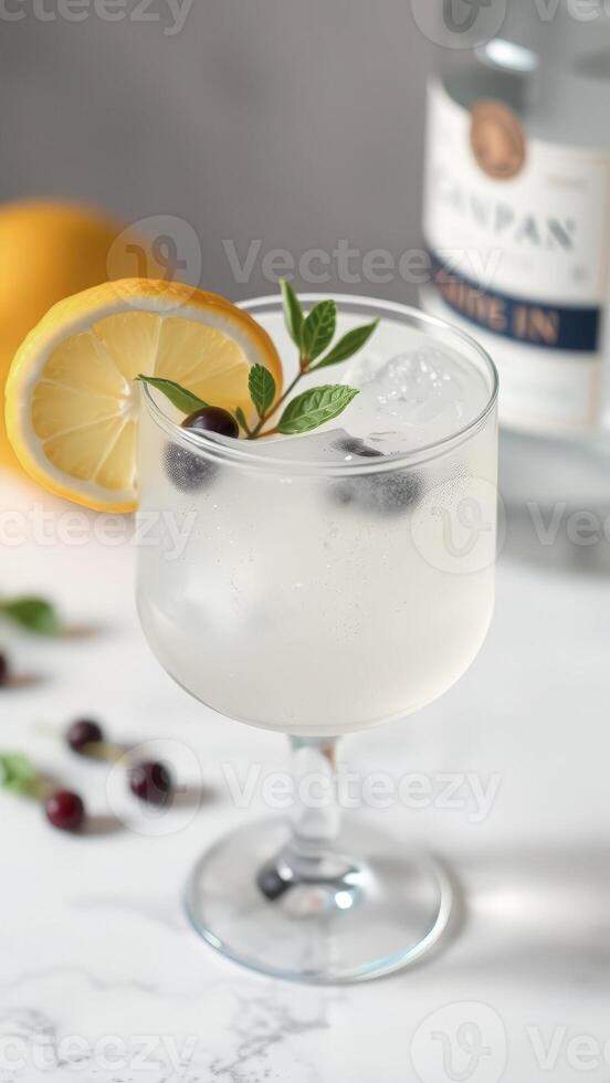 Refreshing Gin and Tonic with Lemon and Berries photo