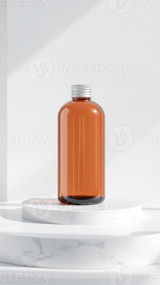 Amber Glass Bottle with Silver Cap on White Marble Platform photo