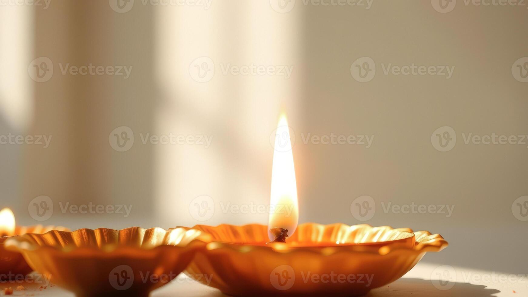 Golden Diya with Flame in Soft Light photo