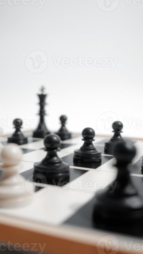 Close Up of Chess Pieces on a Chessboard photo