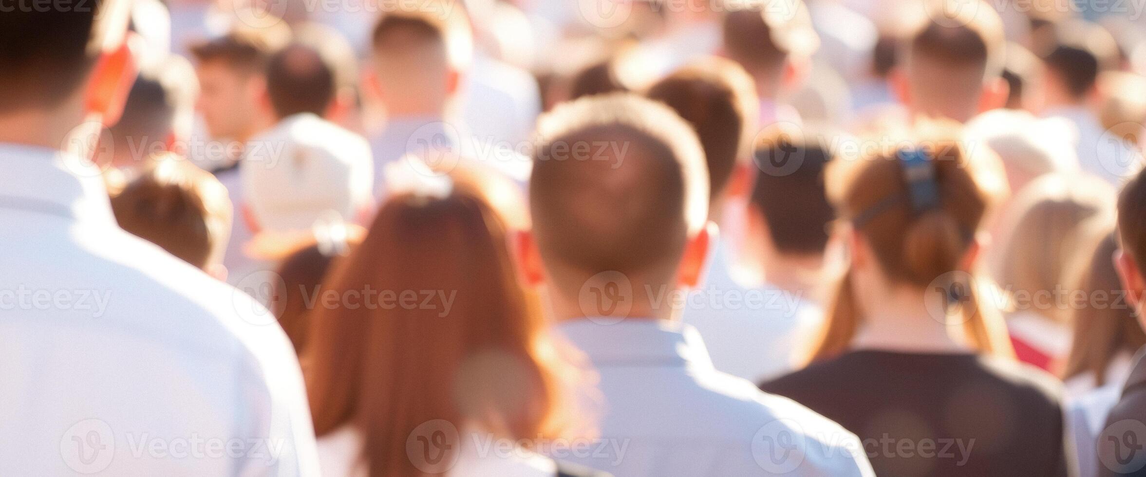 Blurred Crowd of People in the Street photo