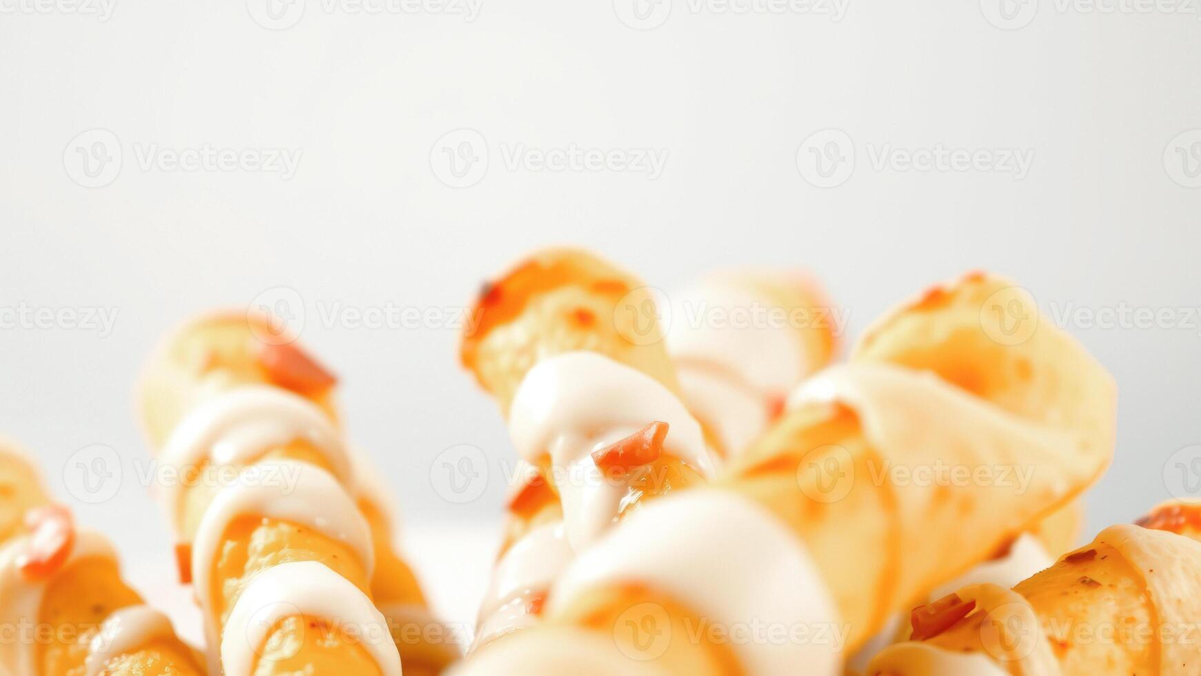 Close Up of Fried Potato Sticks with Creamy Sauce photo