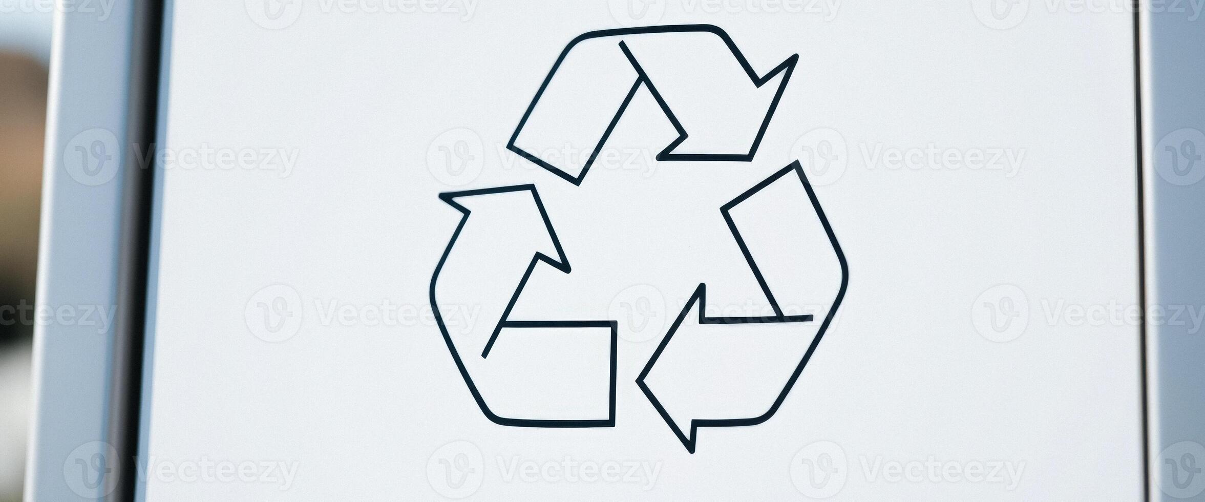 Recycling Symbol on a White Surface photo