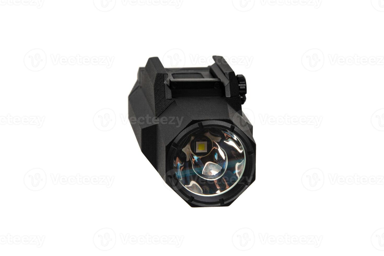Modern LED flashlight with weapon mount. Underbarrel tactical flashlight isolate on white back. photo