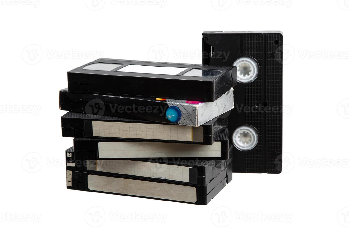 Pile of VHS cassettes. Vintage media. Isolate on a white back. photo