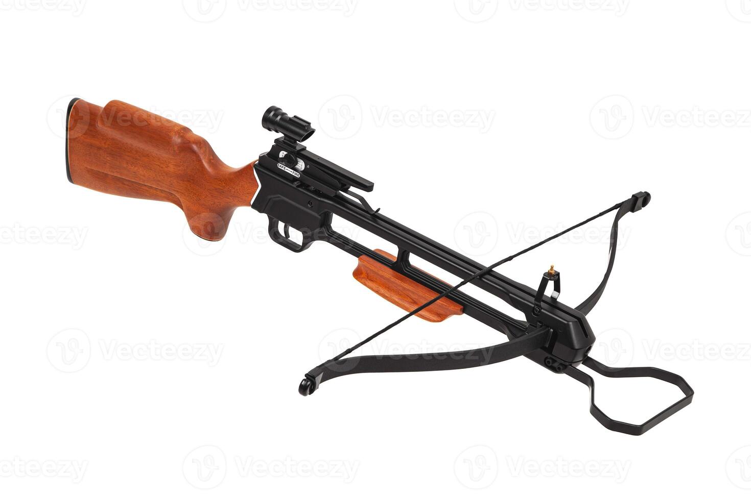 Modern crossbow with a wooden stock. Quiet weapon for hunting and sports. Isolate on a white back. photo
