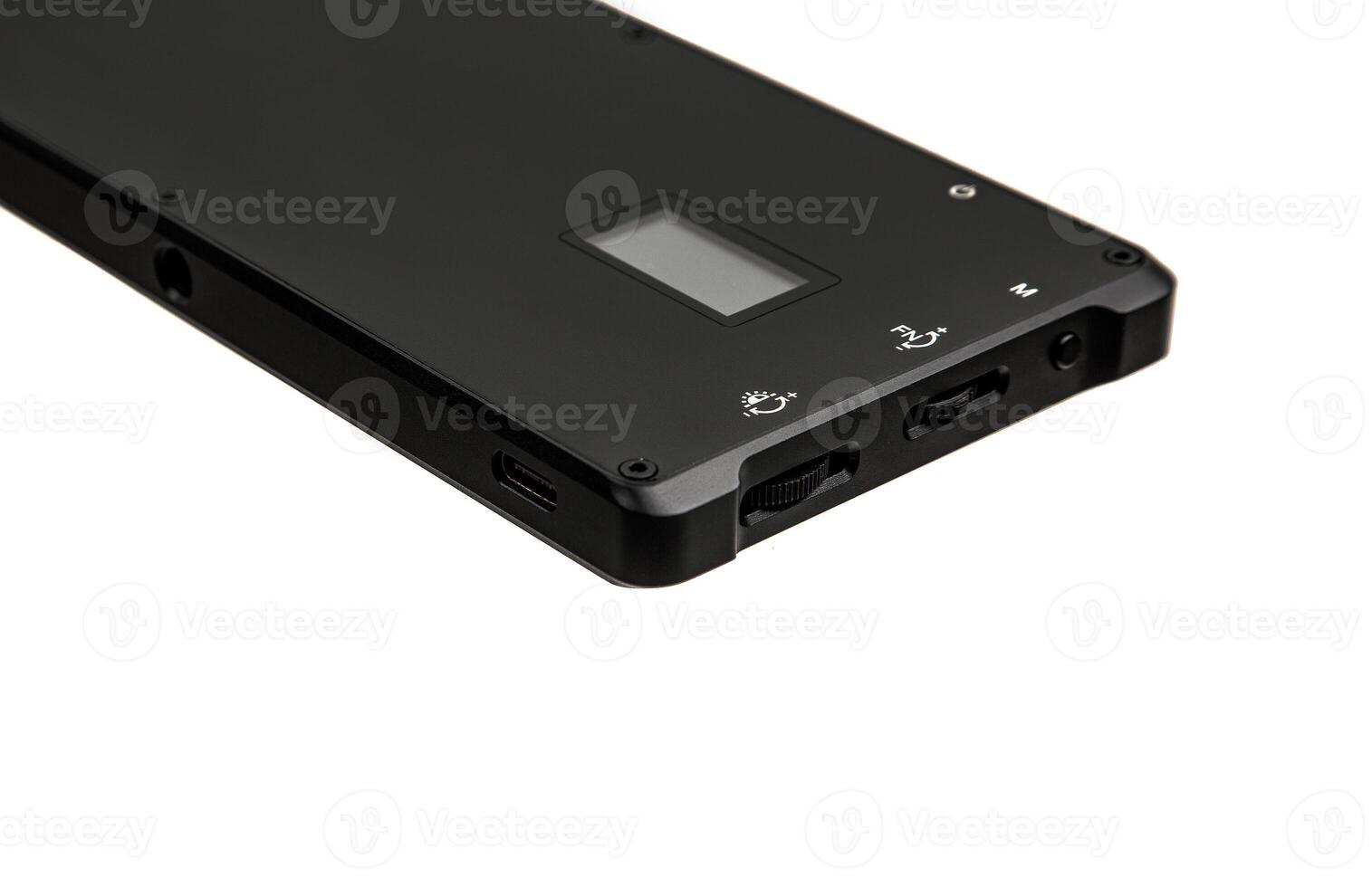 A small portable LED panel on the battery. Lighting device for photo and filming. Isolate on a white back.