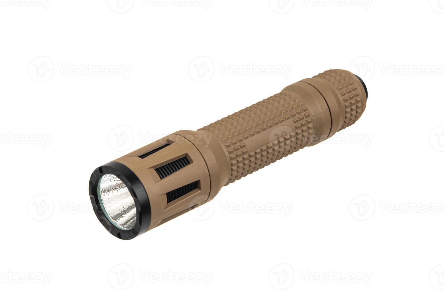 Brown metal LED flashlight isolate on a white back. Pocket lamp for dark time of day or dark rooms. photo