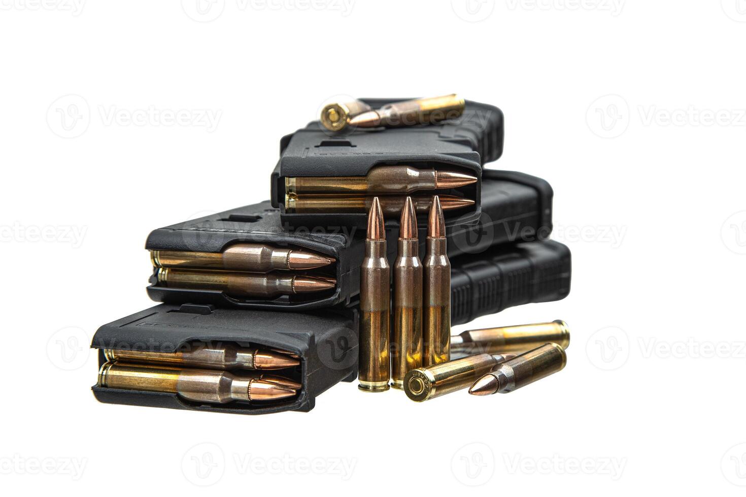 Cartridges and clips for a rifle or carbine. Ammunition for weapons. Isolate on a white back. photo