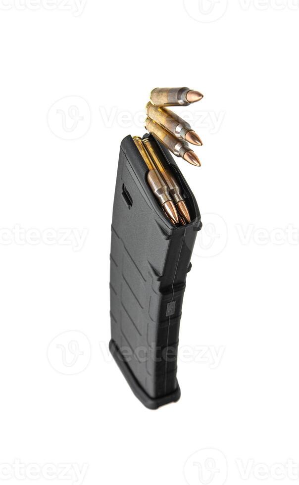 Cartridges and clips for a rifle or carbine. Ammunition for weapons. Isolate on a white back. photo
