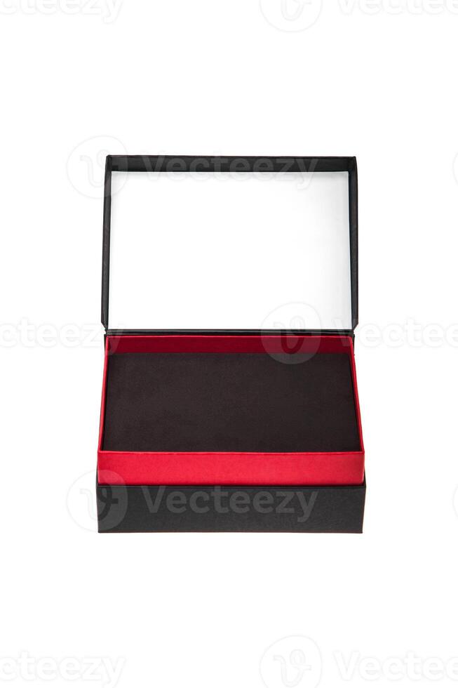 A small open black paper box with a red stripe for a gift. Gift wrapping isolate on white background. photo