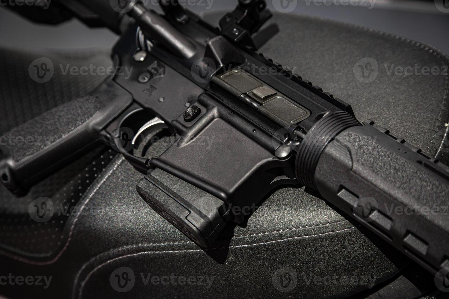 Automatic carabiner on a motorcycle. Weapons for police, special forces and the army. Automatic carbine with mechanical sights. photo