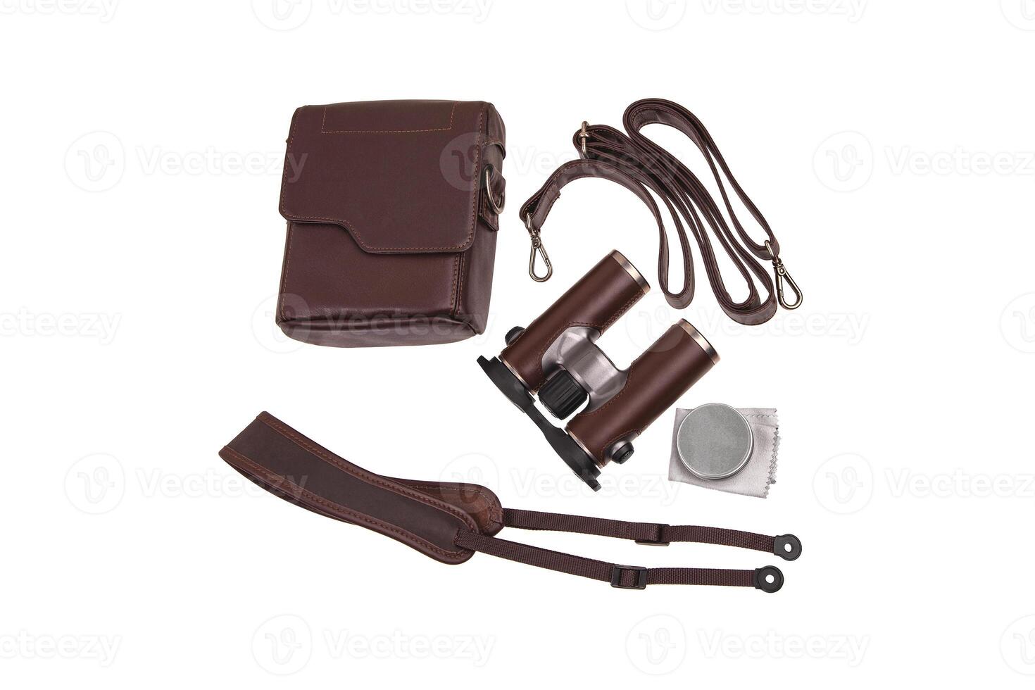 Modern luxury binoculars isolate on a white background. Silver binoculars with leather inserts. An expensive gift for a man. photo