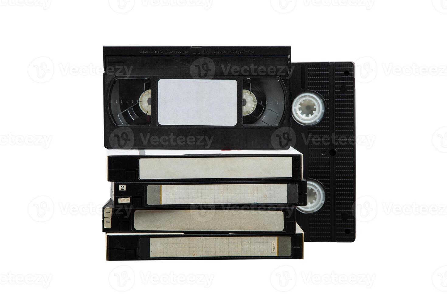 Pile of VHS cassettes. Vintage media. Isolate on a white back. photo