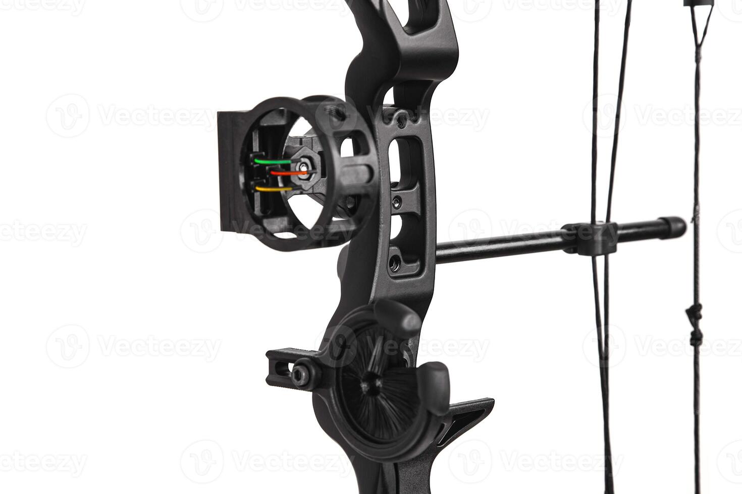 Closeup of the cam on a compound bow. modern, compound hunting bow and arrows isolated on white photo