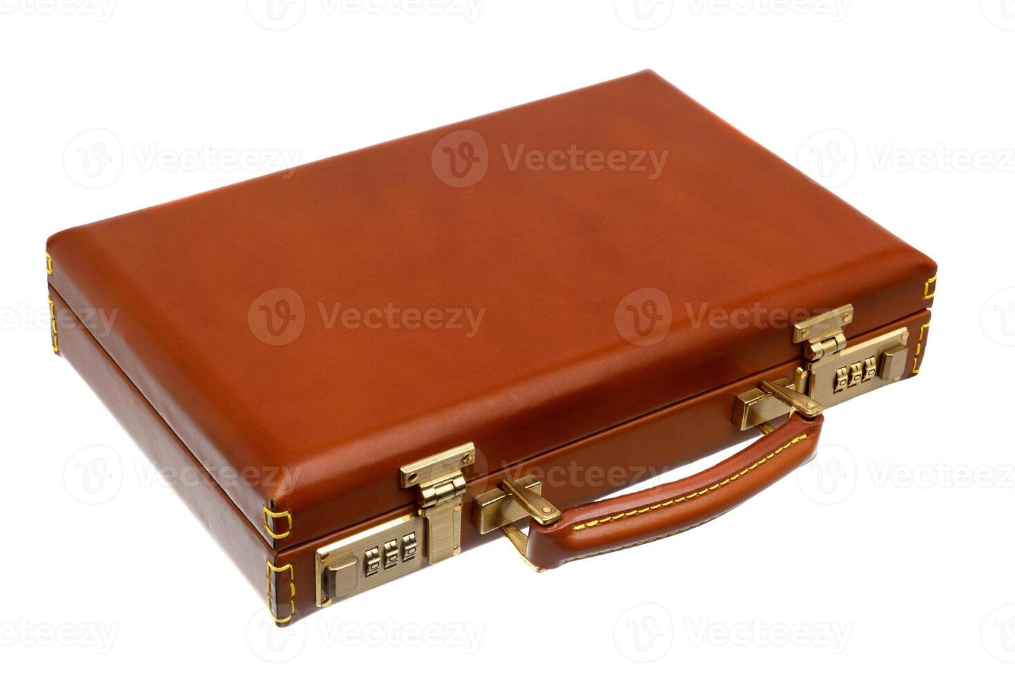Brown leather suitcase with combination lock and gold locks isolated on white photo