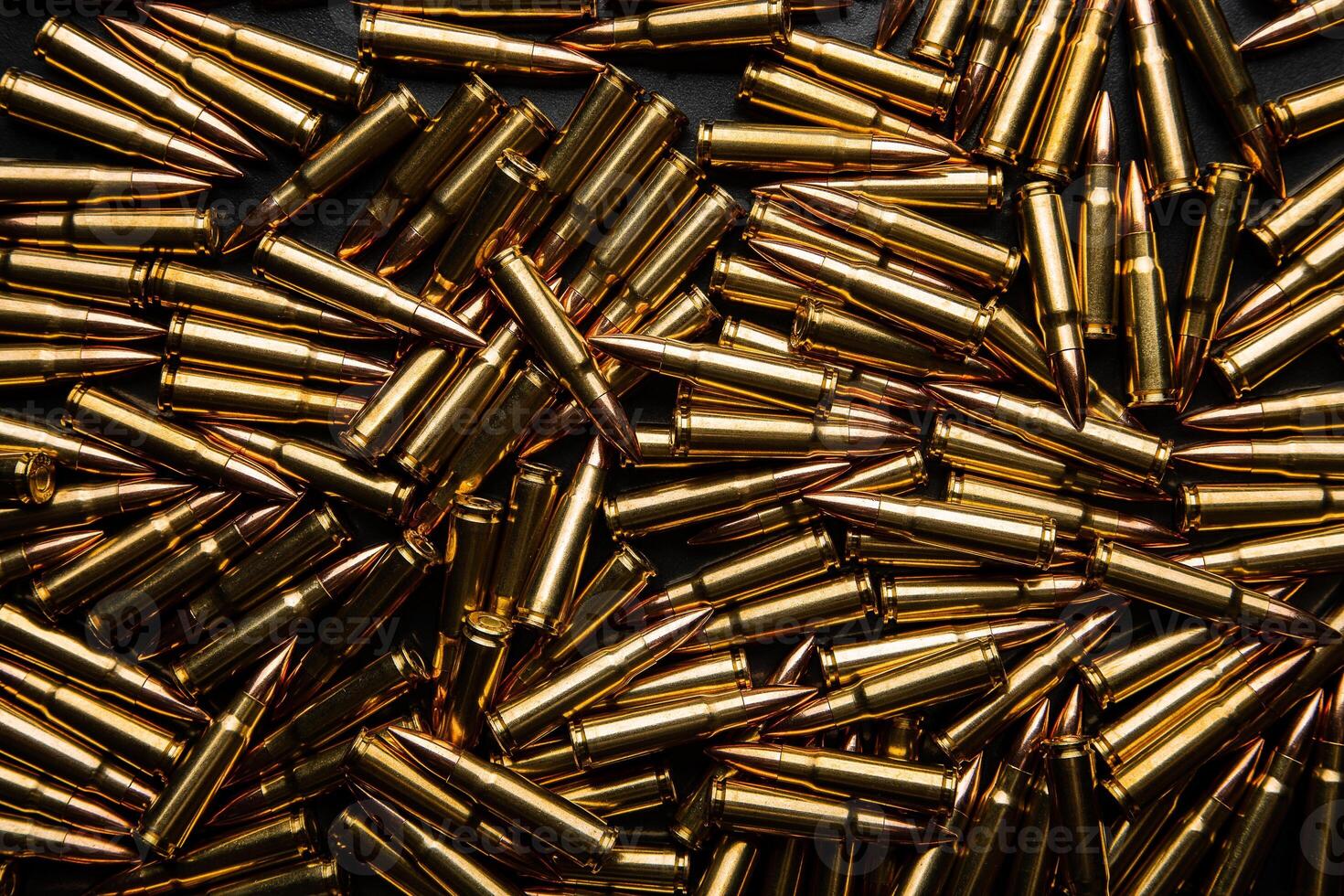 Background from cartridges for a carbine. Ammunition for modern weapons. photo
