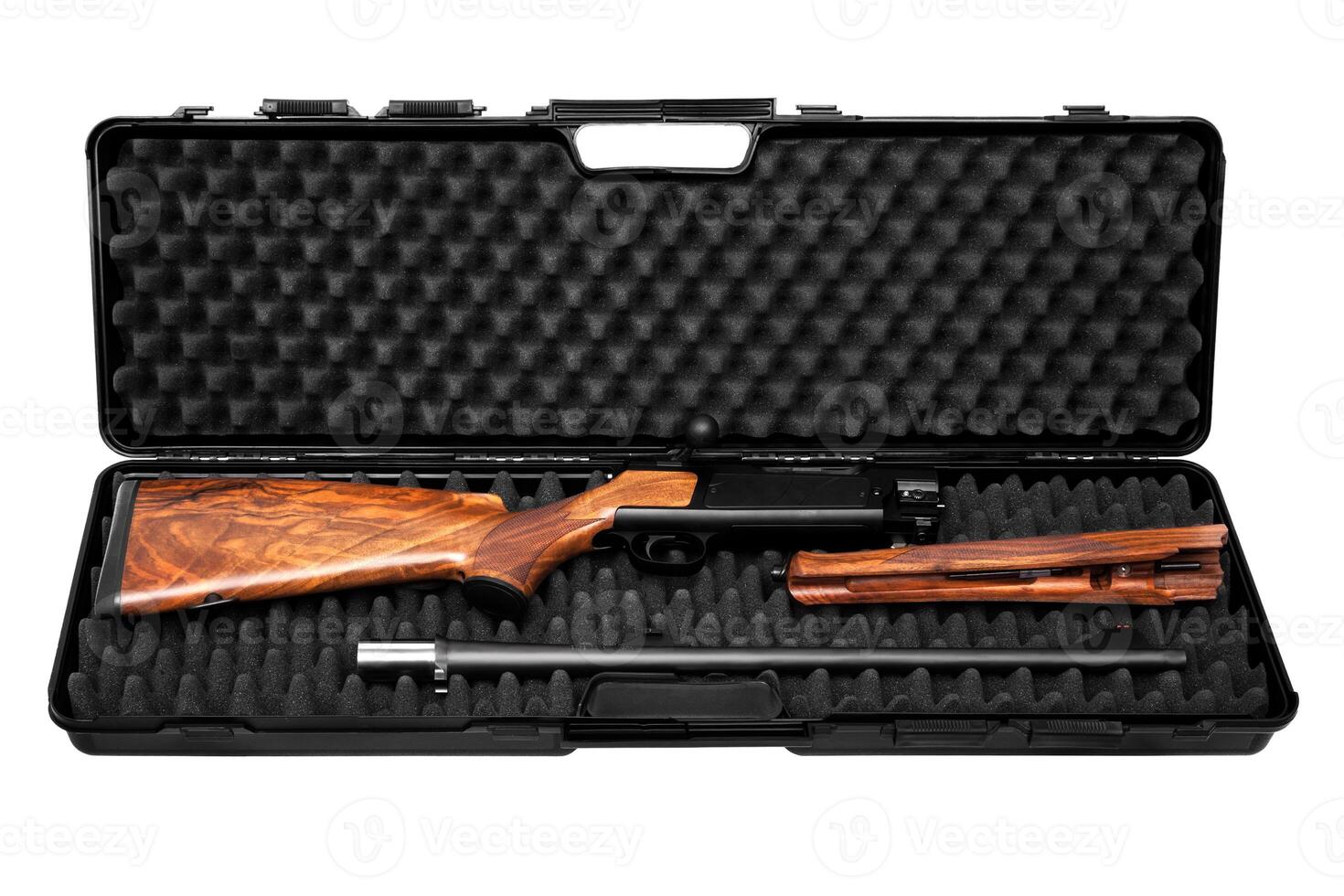 Disassembled hunting rifle in a plastic gun case isolated on white. photo