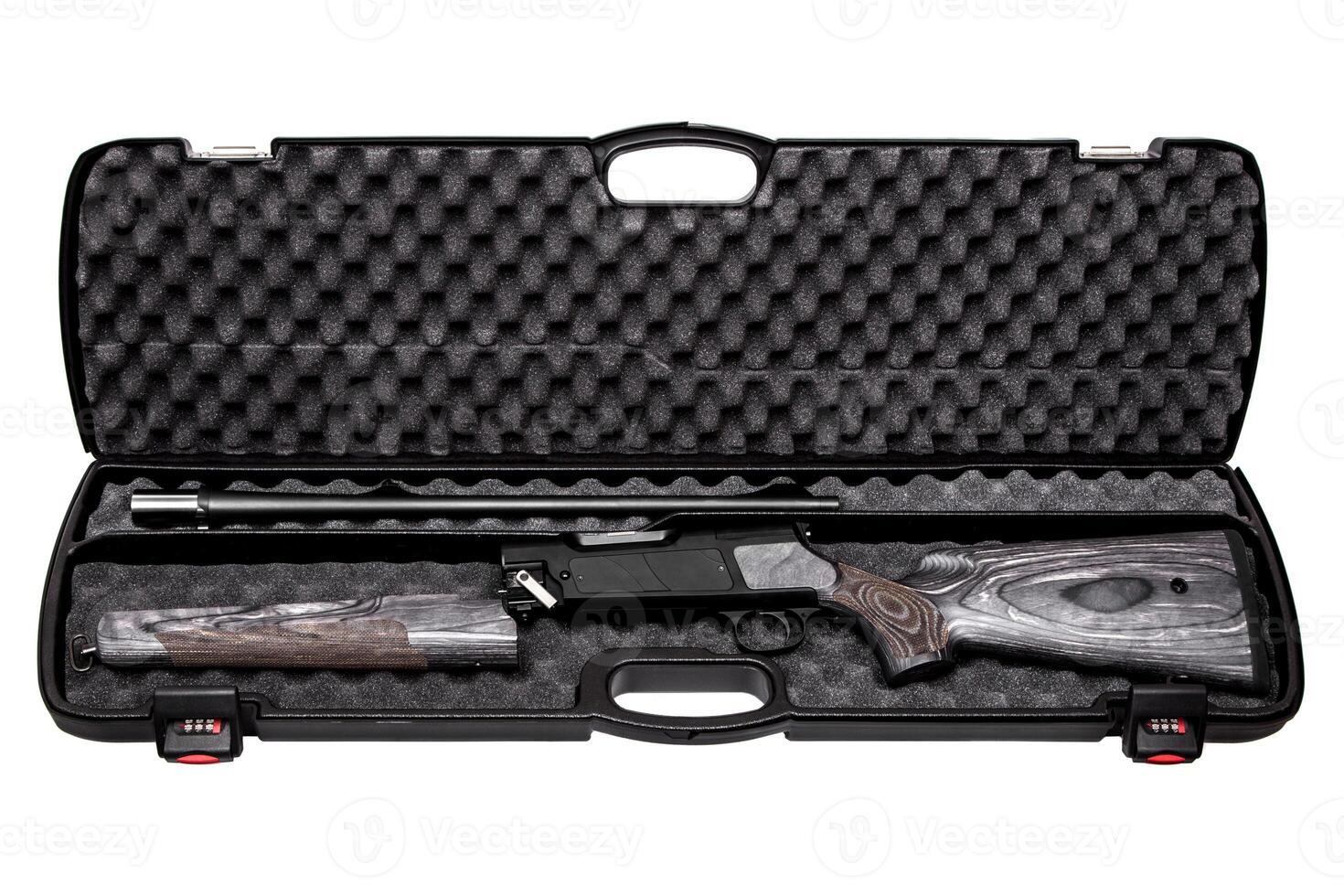Disassembled hunting rifle in a plastic gun case isolated on white. photo