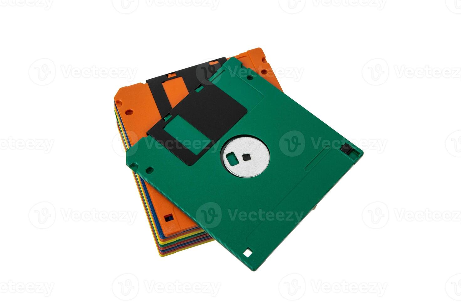 Multi-colored 3.5 floppy disks. Obsolete magnetic storage medium. Isolate on a white back. photo