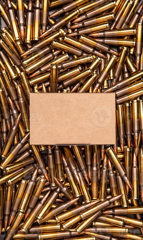 Background from cartridges for a carbine. A box of cartridges. Ammunition for modern weapons photo