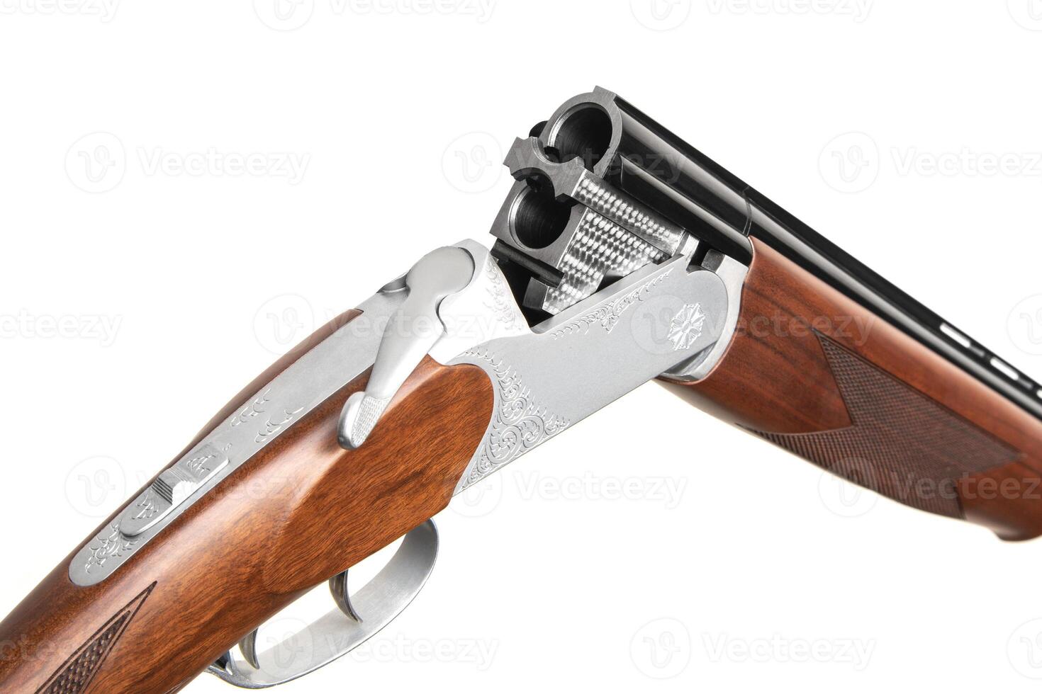 Double-barreled hunting rifle. Breakthrough 12 gauge smoothbore shotgun. Weapons for hunting and sports. Isolate on a white back. photo