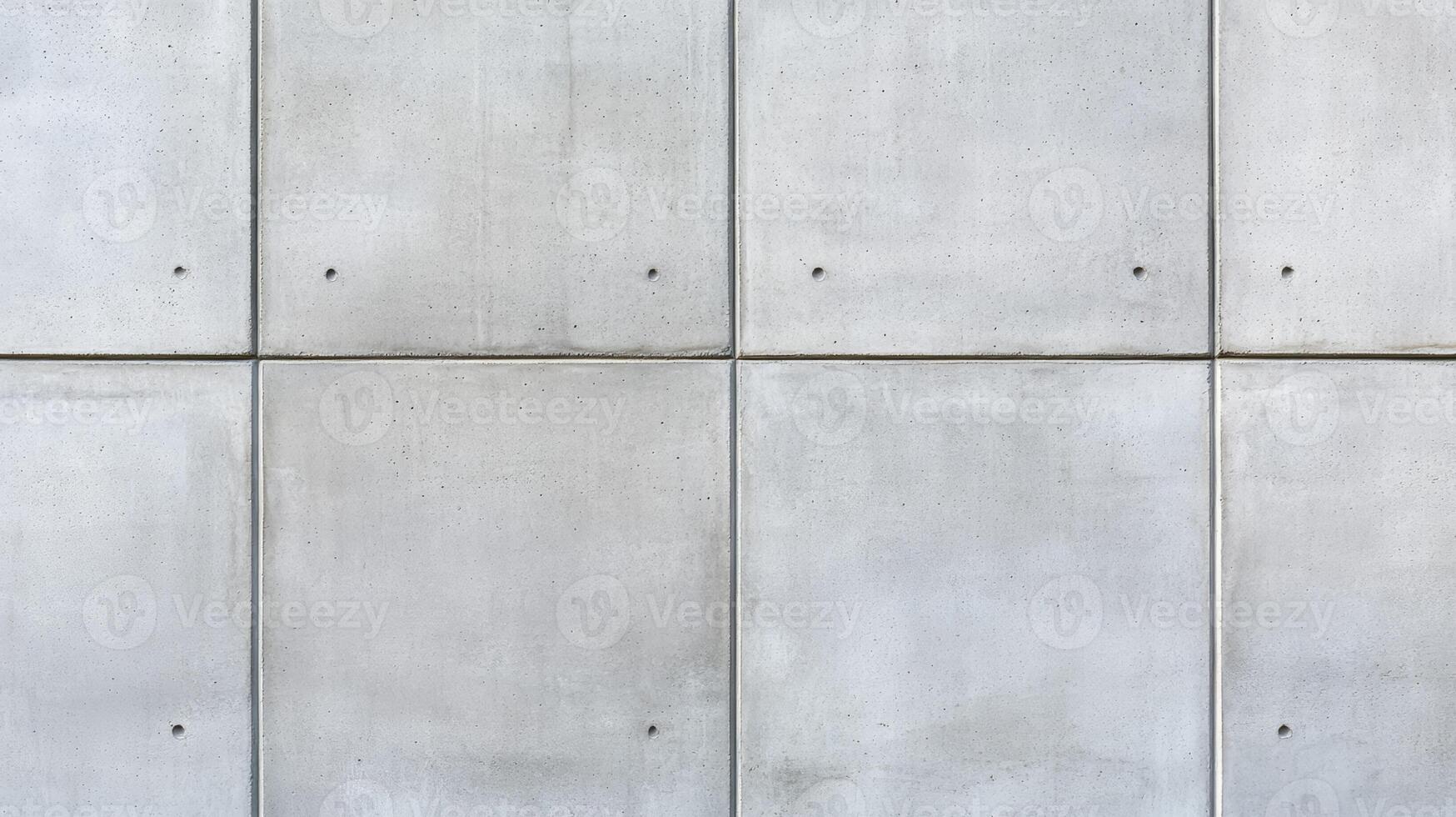Angled shot of a plain concrete wall slightly textured surface with a uniform gray tone creating a minimalist and timeless background photo
