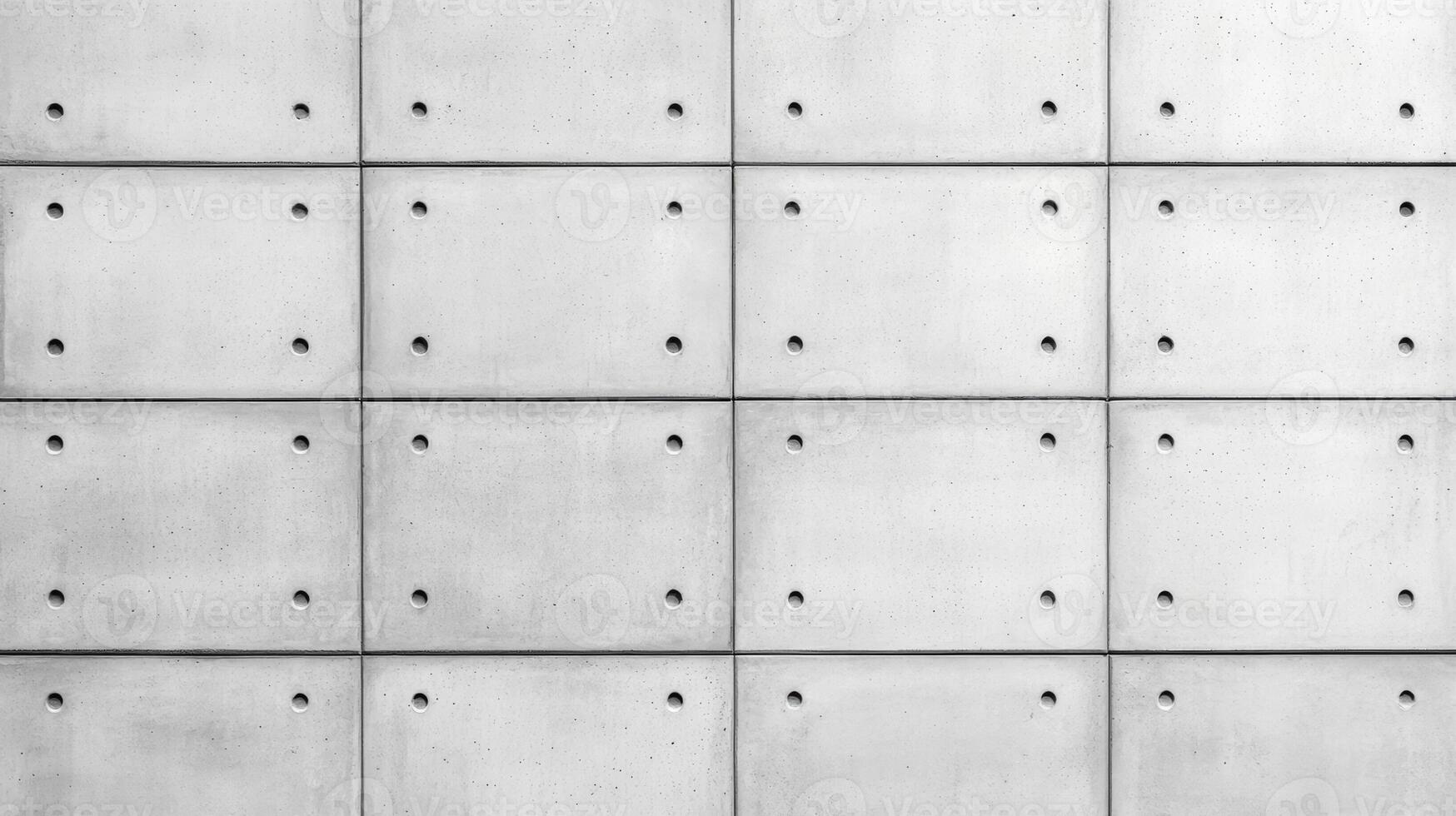 Closeup of a plain concrete wall background with smooth texture and subtle variations in light gray tones ideal for minimalist and modern designs photo