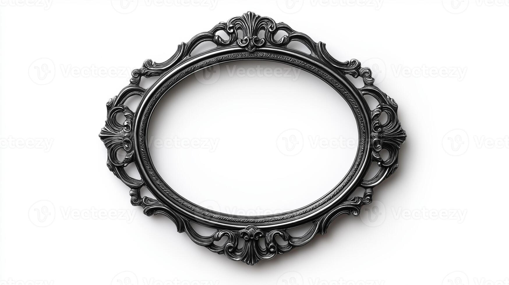 Top view of a vintage oval picture frame with a delicate lace like pattern and a slightly tarnished silver finish isolated on a white background with soft diffused shadows photo