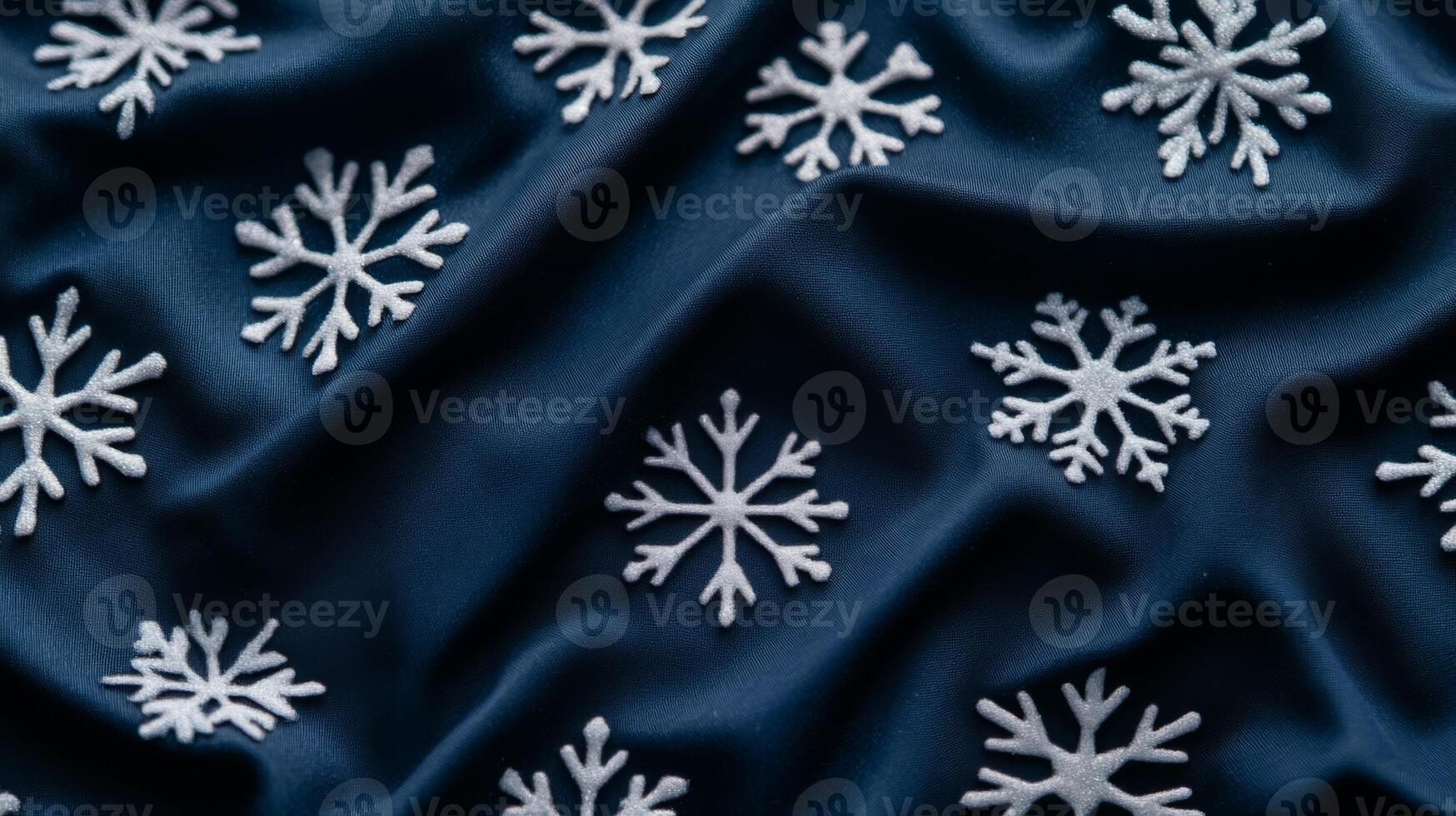 Dark midnight blue fabric background with faint glowing snowflake patterns scattered in an elegant winter Christmas holiday design smooth and cozy feel highlighting seasonal joy and tranquility photo
