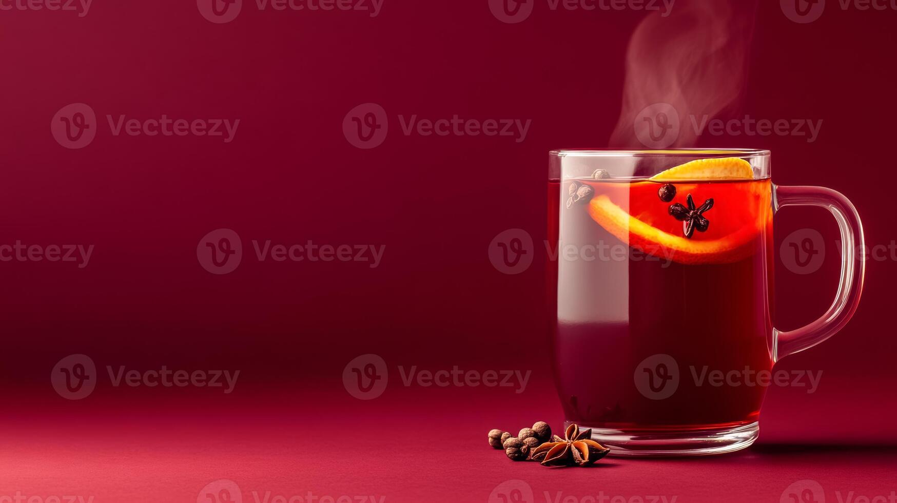 Cozy mulled wine with red wine, cloves, and orange slices, steam rising from the glass mug, warm autumn hues on a gradient background transitioning from deep burgundy to golden amber photo