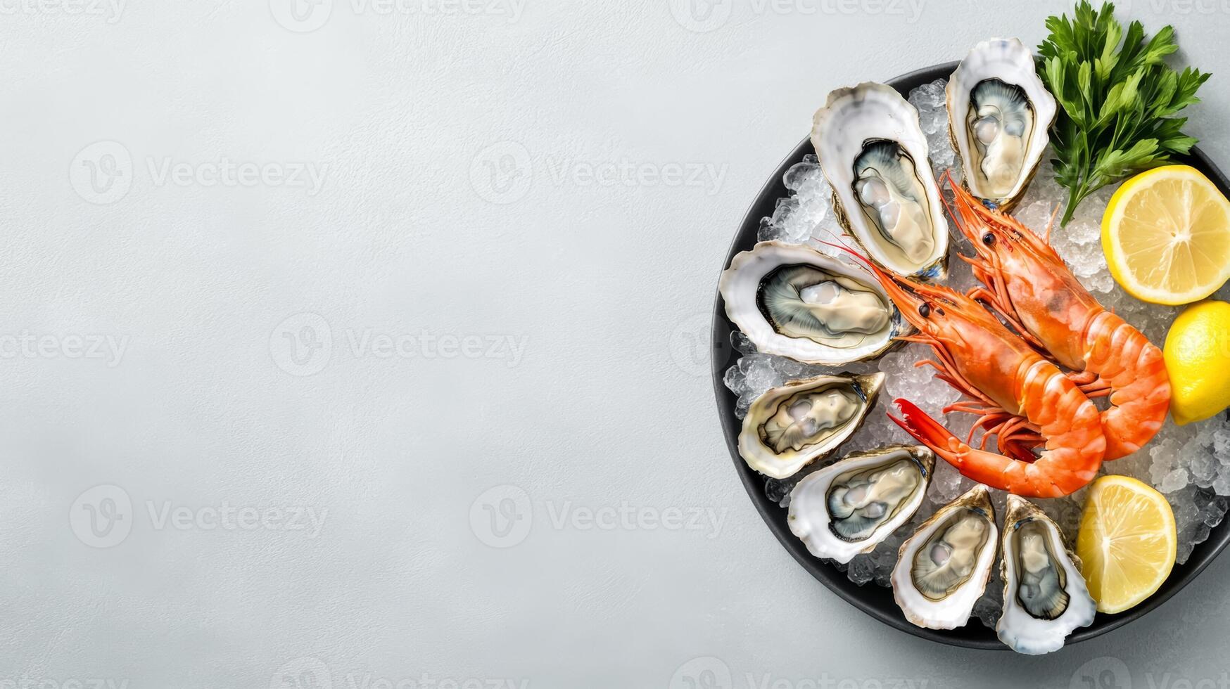 Fresh seafood platter with shrimp, oysters, and crab claws, served on crushed ice with lemon wedges, positioned on one side of the frame with plenty of empty space for text photo