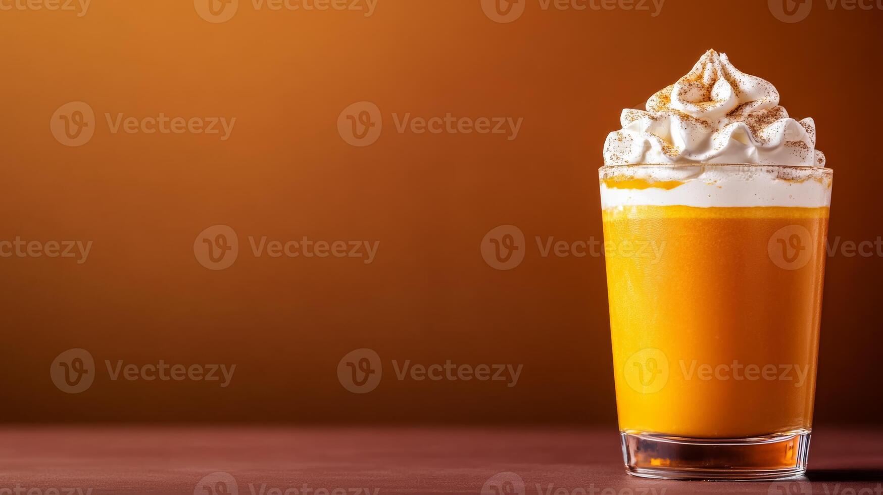 Seasonal pumpkin spice cocktail with rum and cream, garnished with whipped cream and nutmeg, served in a glass tumbler against a gradient background fading from burnt orange to dark brown photo