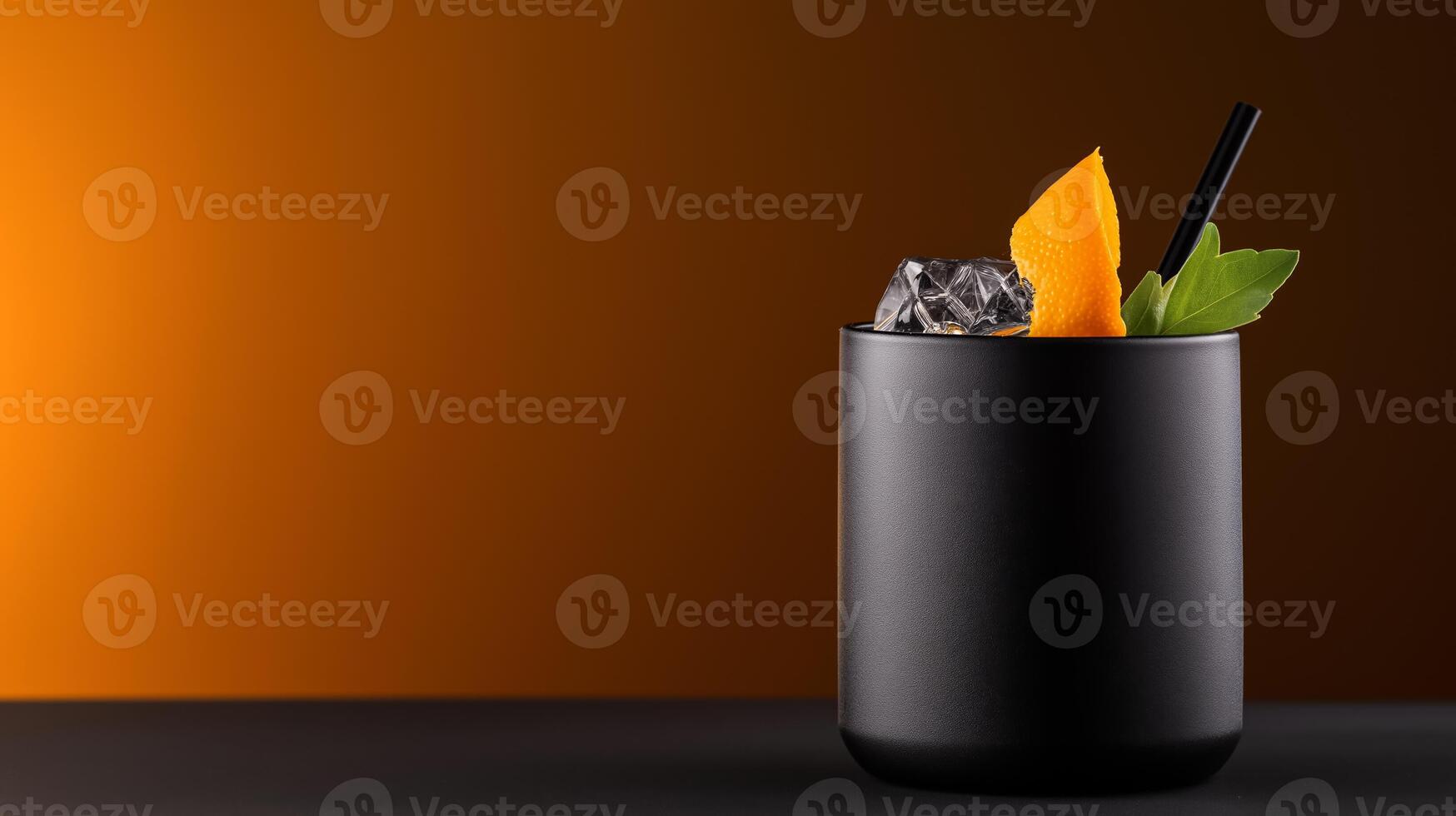 Unique smoky mezcal cocktail with activated charcoal, lime, and agave, served in a matte black glass with an orange peel garnish, against a gradient background from deep charcoal to amber photo