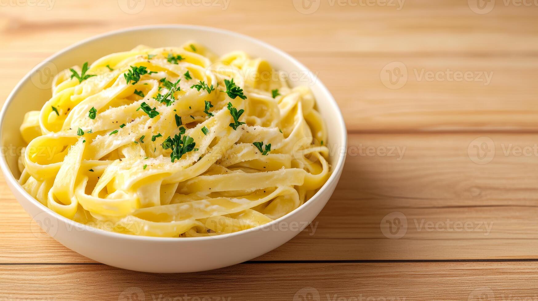 Vibrant pasta dish with creamy Alfredo sauce, fettuccine, and fresh parsley, presented in the lower half of the frame with empty space above for text, warm gradient background photo