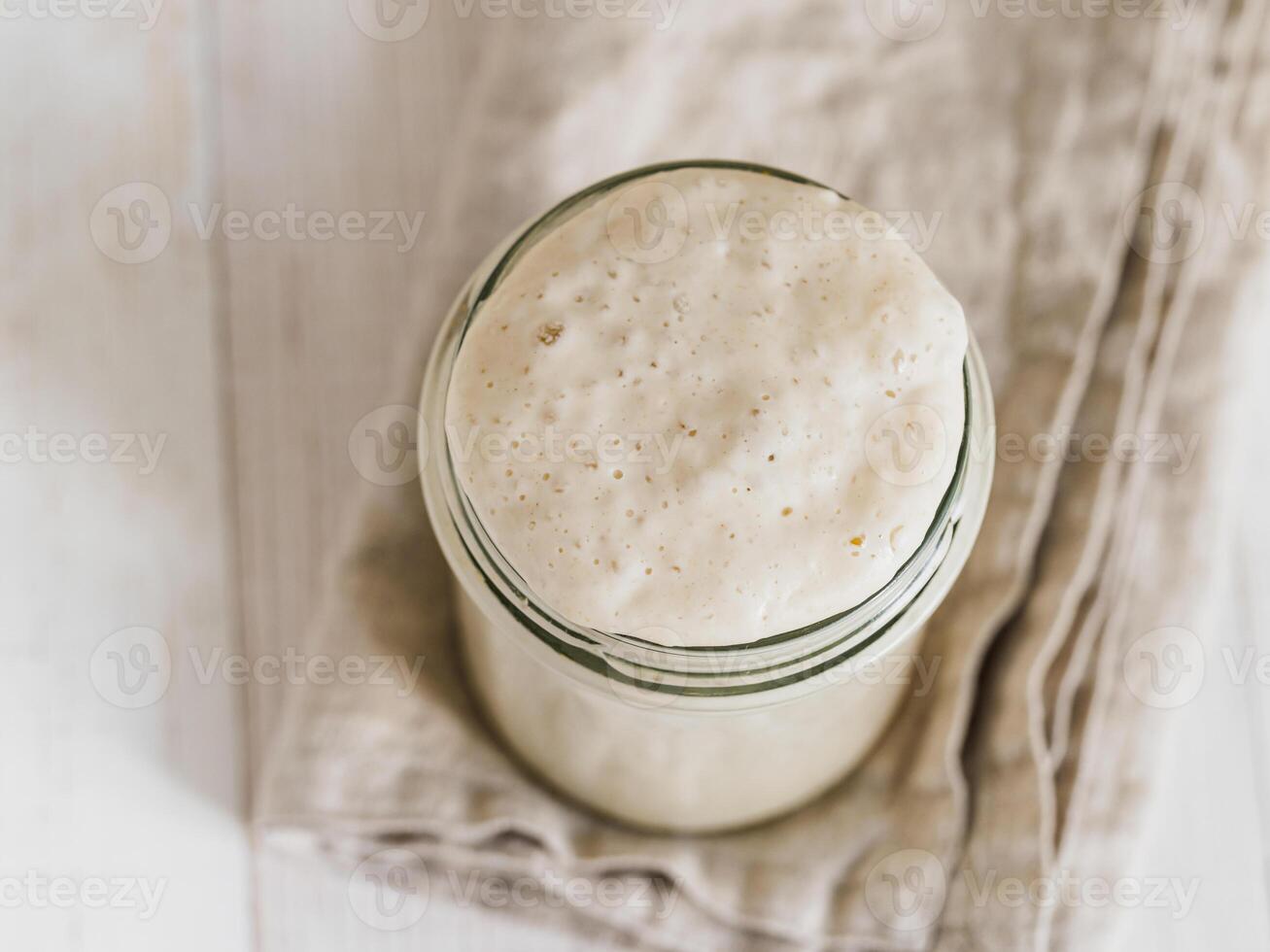 Wheat sourdough starter, top view, copy space photo