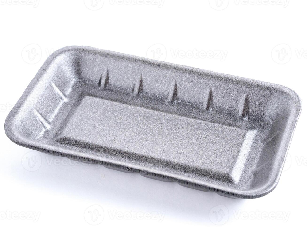 Black empty food tray. Isolated on white photo