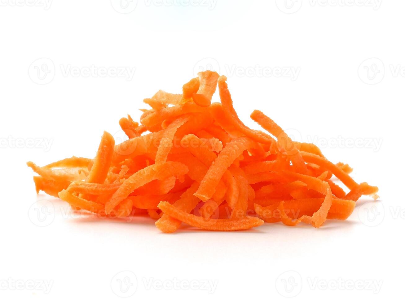 Grated carrots isolated on white photo