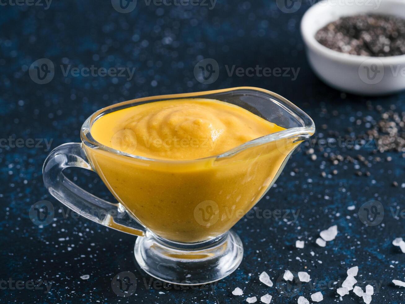 Vegan creamy cheddar cheese sauce with chia seeds photo