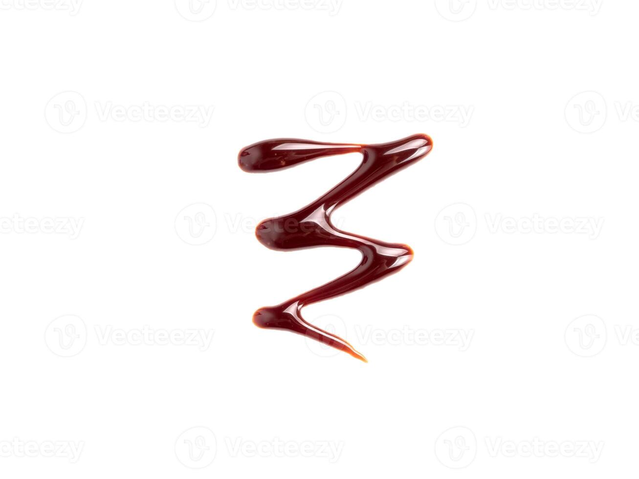 Chocolate sauce isolated on white background photo