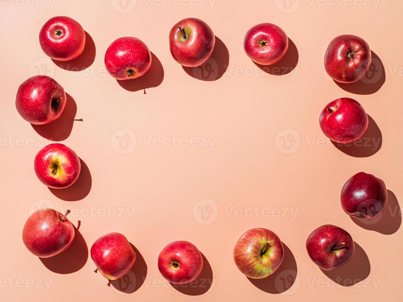 Bright backgroud with apples, copy space in center photo