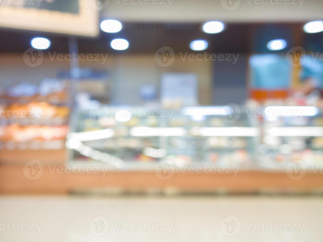 blur bakery shop with bokeh as background photo