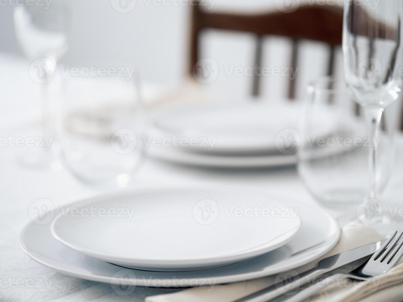Beautiful table setting in white colors photo