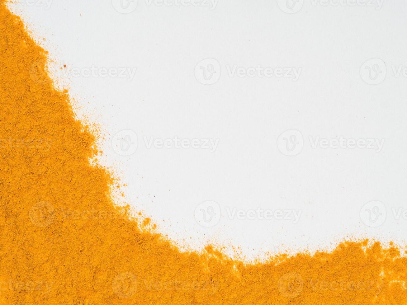 Turmeric Powder on white with copy space photo