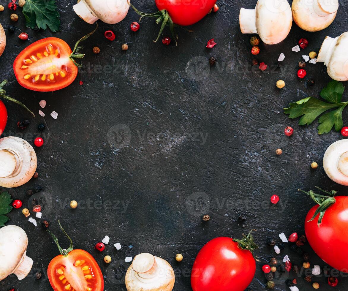 Food ingredients on black background, copy space photo