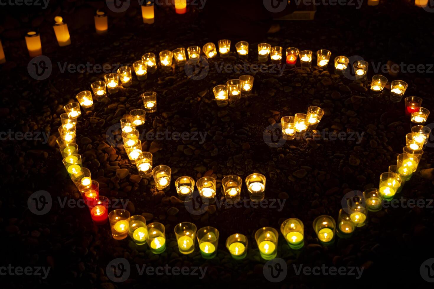 Burning romantic candles at night medium shot photo