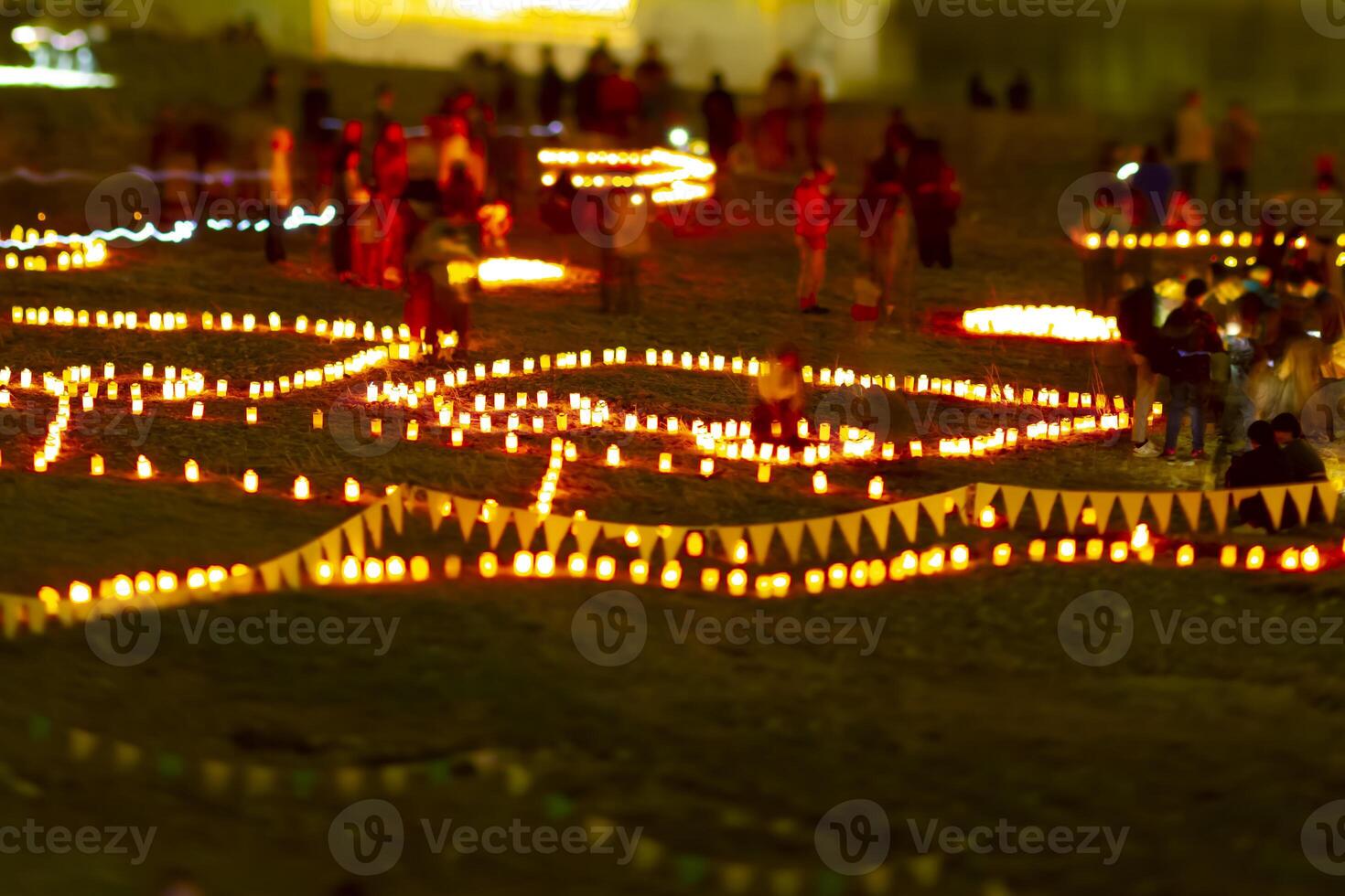 A burning romantic candles medium shot tiltshift at dusk photo