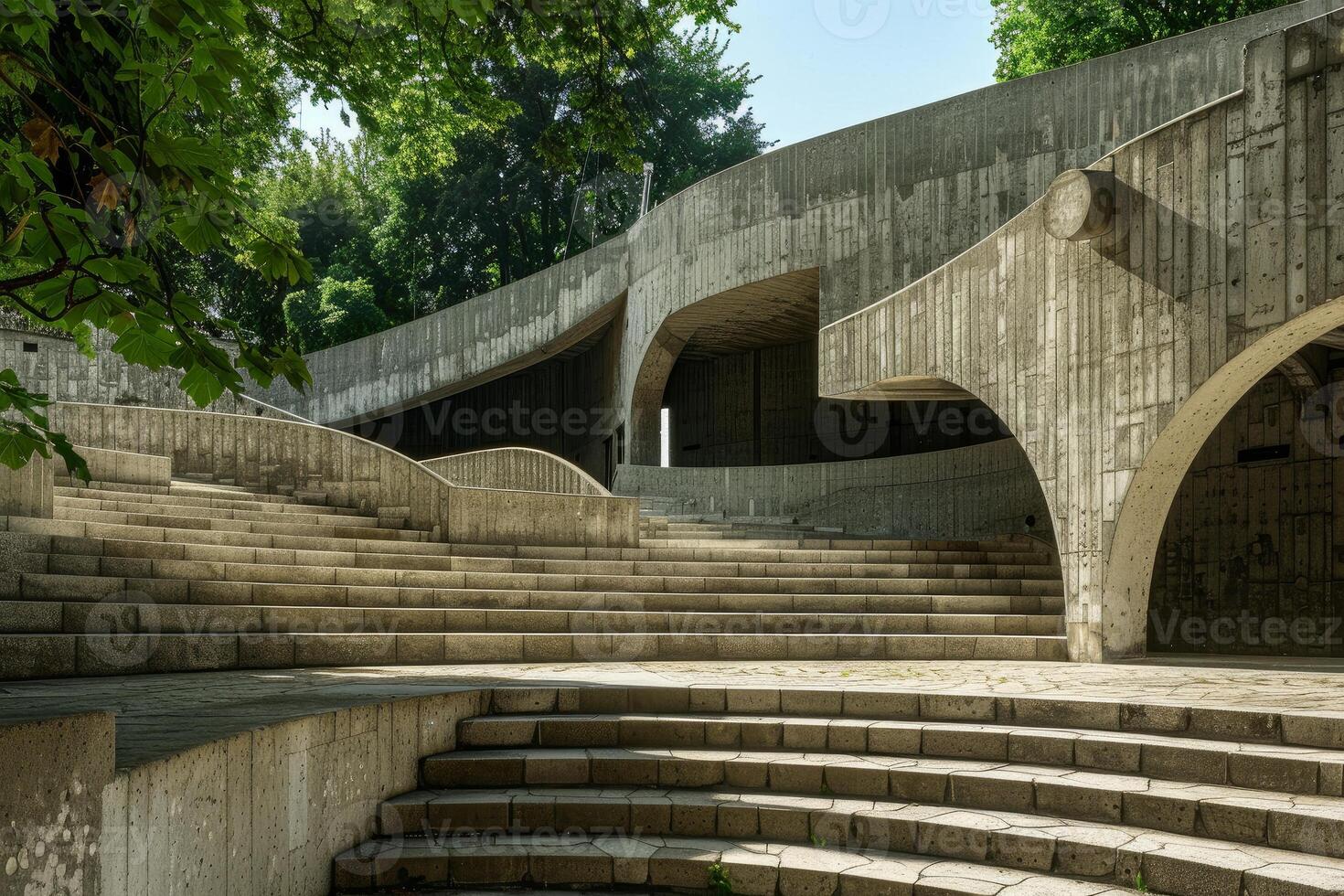 Brutalism architecture featuring stone stairs with curved shapes photo